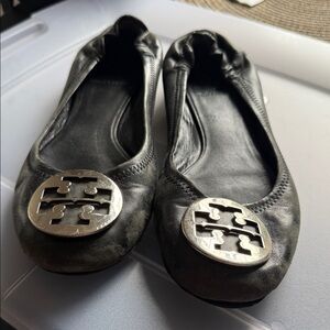 Tory Burch Black Leather Logo Ballet Flats with Silver Emblem